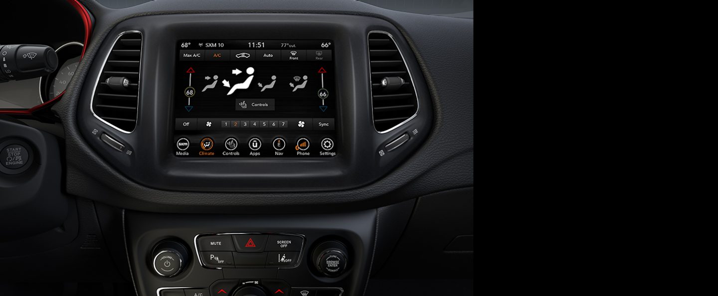 The Dual-Zone Automatic Temperature Controls on the Uconnect touchscreen and the center stack in the 2020 Jeep Compass.
